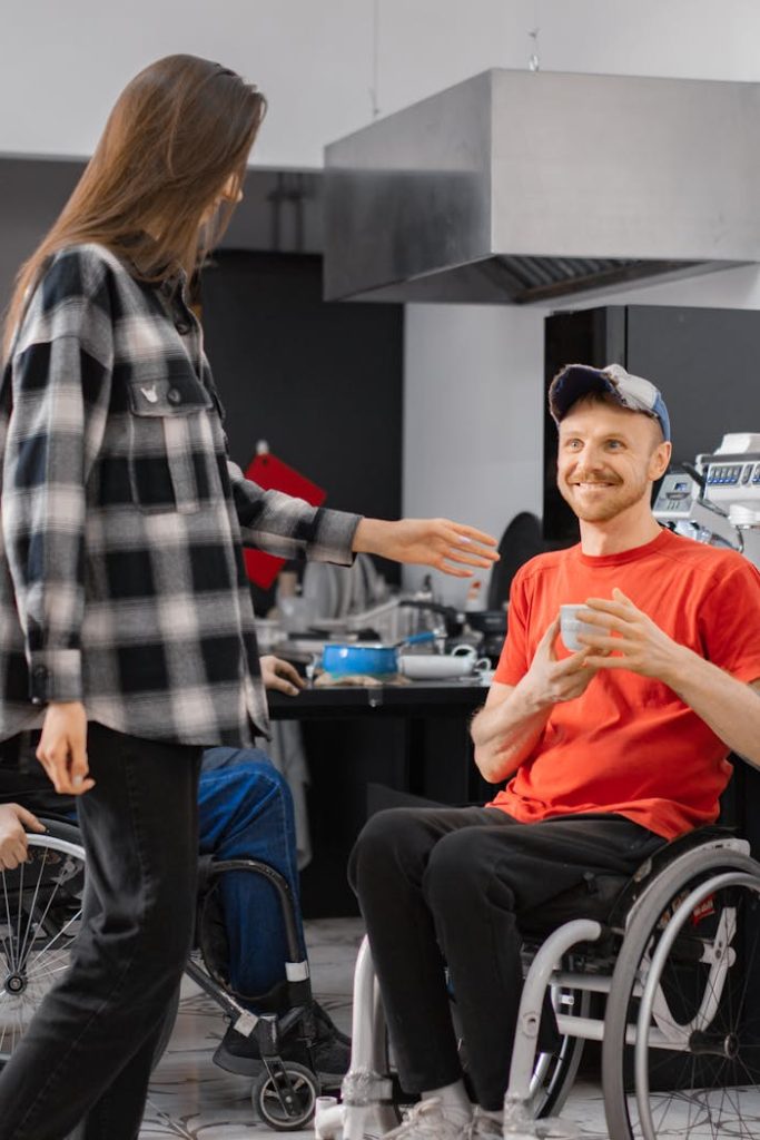 A Happy Man in an Orange Shirt Holding a Cup of Coffee